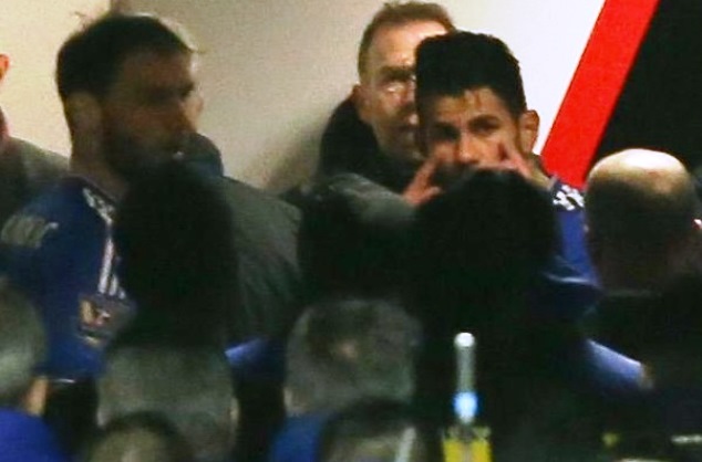 Diego Costa gestures at Mike Dean