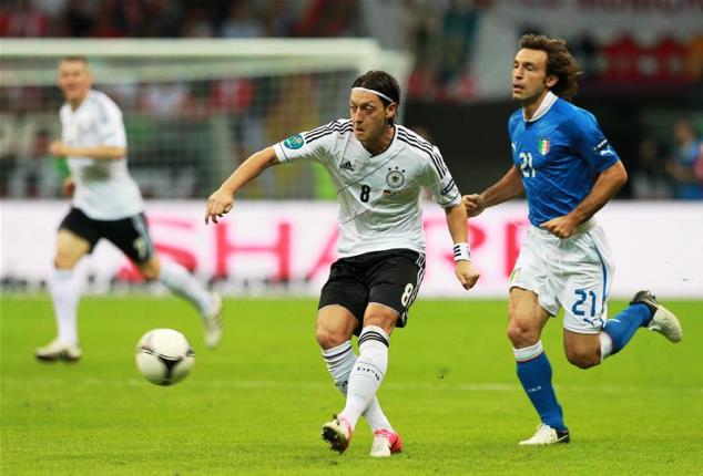 Ozil and Pirlo in action 