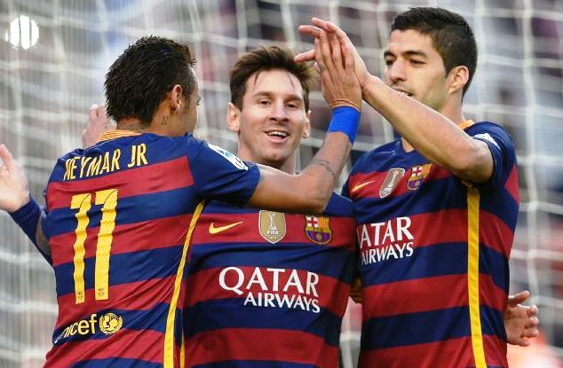 Messi, Neymar and Suarez celebrate one of their goals for Barcelona
