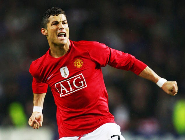 Ronaldo celebrates one of his goals for Man United