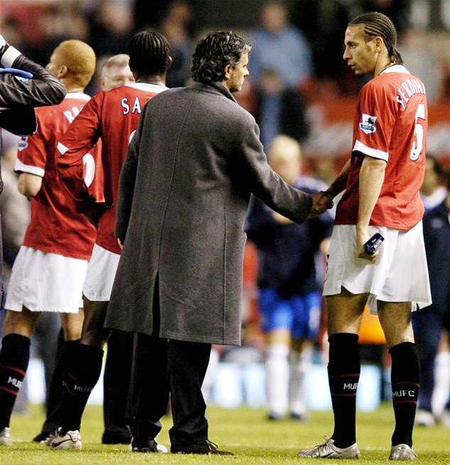 Mourinho shakes hand with ex-Man United star Rio Ferdinand during a previous league match