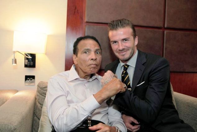 The late Muhammad Ali with former England international David Beckham