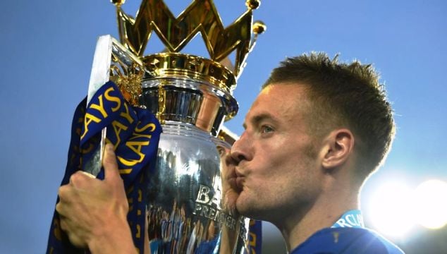 Jamie Vardy kisses the Premier League title after helping Leicester City win it for the first time in their history in 2015/16