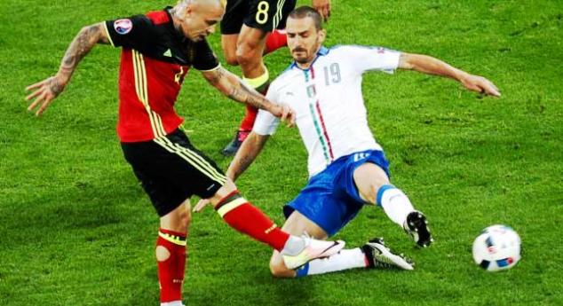 Italy's Leonardo Bonucci blocks Radja Naingollan's shot at the Euro 2016 during Belgium vs Italy