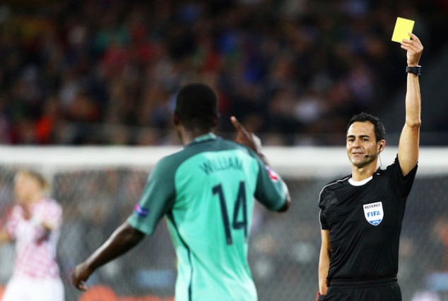 William Carvalho receives a yellow card during the Croatia vs Portugal Euro 2016 quarter-final match