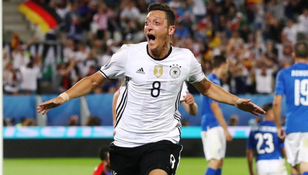 Ozil celebrates scoring against Italy in the quarter-finals of the European Championship in France
