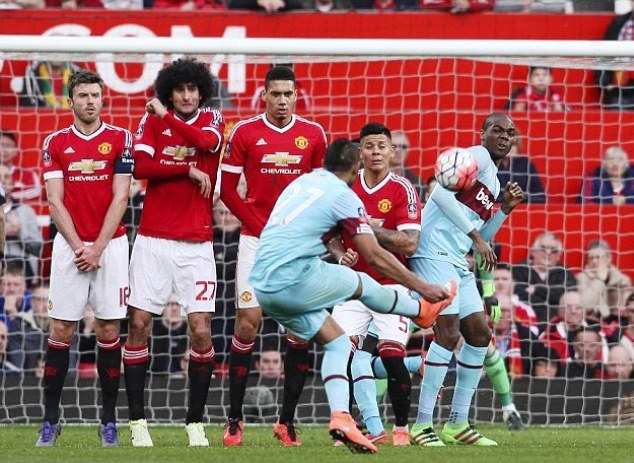 Payet curls the ball behind Man United's ball in the FA Cup semi-final clash last season