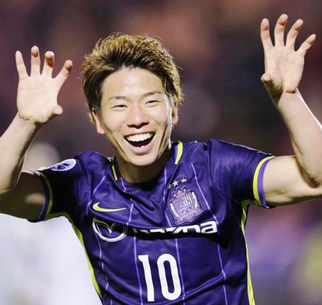 Takuma Asano celebrates one of his goals for Sanfrecce Hiroshima