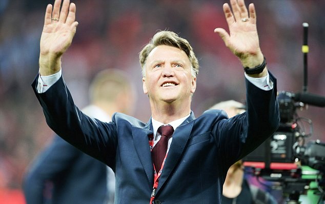 LVG acknowledges the crowd at a Premier League match as Man United boss