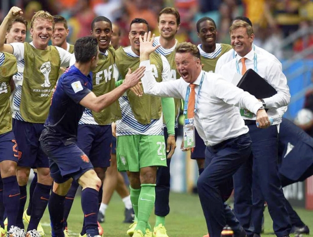 Robin Van Persie  of the Netherlands celebrates with manager Louis Van Gaal after scoring against Spain in the 2014 FIFA World Cup
