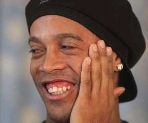 Ronaldinho's transfer from AC Milan to Flamengo is complete. The midfielder is back to football in Brazil.