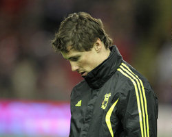 Fernando Torres at Liverpoo, not happy...  thinking of a transfer