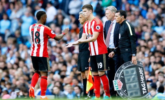 Paddy McNair (right) comes in as a substitute to replace Jermain Defoe during the Premier League match against Man City