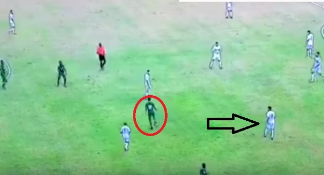 The ball calmly rests on his foot as the Algerian defender goes the wrong way