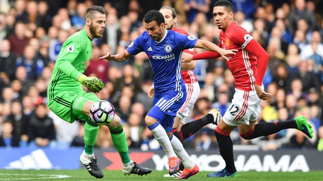 Chelsea's Pedro on his way to scoring against Man Utd in the Premier League on October 23, 2016