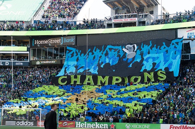 'CHAMPIONS' one giant banner declared