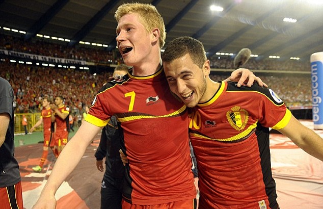De Bruyne (L) celebrates with his teammate Eden Hazard in a previous match for Belgium. Both could miss the match against Greece.