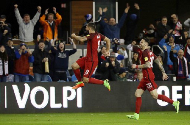 The ex-Tottenham Hotspur man (L) celebrates his hat-trick vs Honduras on Friday