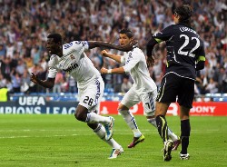 Emmanuel Adebayor set the Santiago Bernabeu on fire against Spurs in the Champions League and boosted his chances of remaining at Real Madrid alongside Cristiano Ronaldo and company.