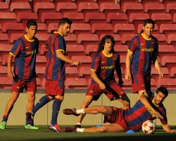 Barcelona are training seriously for their Champions League match against AC Milan.