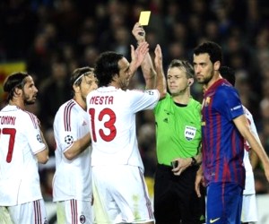 Barcelona, AC Milan and B. Kuipers engaged in a controversial match at the Camp Nou.
