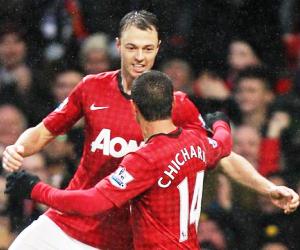 Johnny Evans and Chicharito stole the headlines for different reasons on Boxing Day in the EPL.