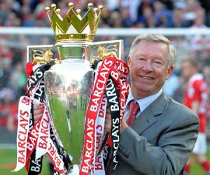 Alex Ferguson lifting the 2010/11 English Premier League title - his 12th and Manchester United's 19th.