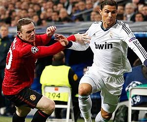 Cristiano Ronaldo and Wayne Rooney will engage in a duel during Manchester United vs Real Madrid - a big UEFA Champions League clash which will be live from 14:45 EST on several television channels around the world this Tuesday, March 5, 2013.