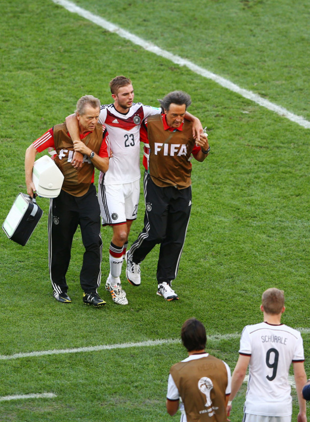 Cristoph Kramer being carried out of the Final Match between Argentina and Germany