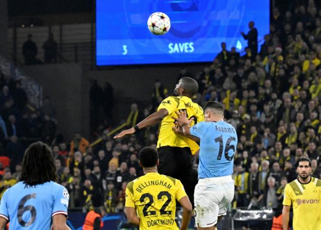 Dortmund reach last 16 after Mahrez's penalty miss