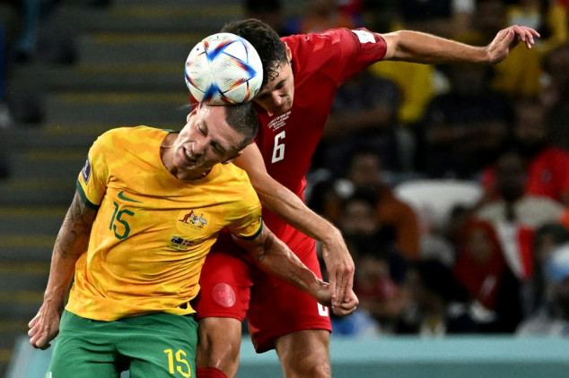 Australia reach World Cup last 16 and send Denmark home
