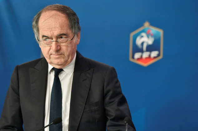 Damning report turns up heat on suspended French football boss