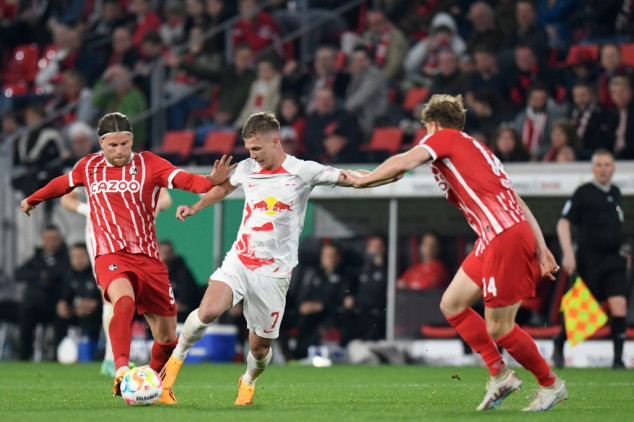 Outstanding Olmo steers ten-man Leipzig to German Cup final