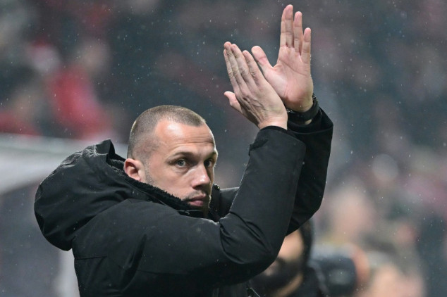 Ajax seek new coach after releasing Heitinga