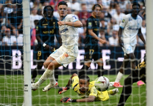 Marseille squeeze past Reims in Ligue 1 opener