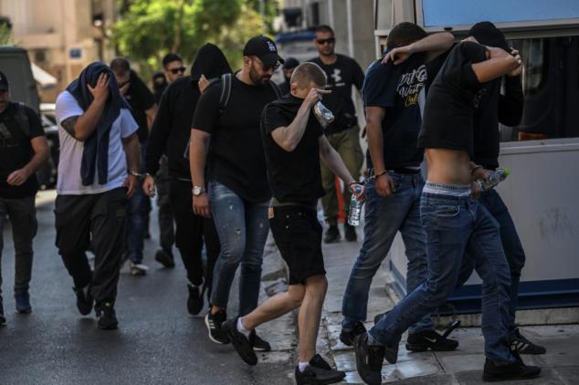 Forty charged after fatal stabbing of Greek football fan