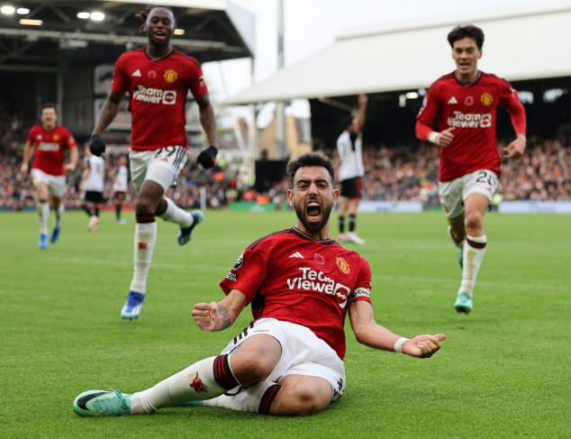 Fernandes rescues Man Utd, Man City hit Bournemouth for six