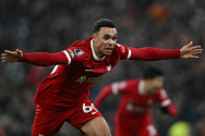 Liverpool hit late double to preserve Premier League home record