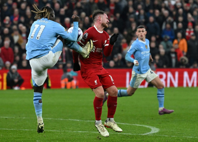 Man City hold out for Liverpool draw to leave Arsenal top of Premier League