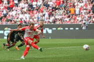 Kane doubles up for Bayern, Leipzig beat Dortmund to tighten grip on fourth