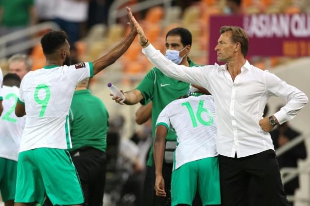 Saudis down Japan to stay perfect in World Cup qualifying, Wu rescues China