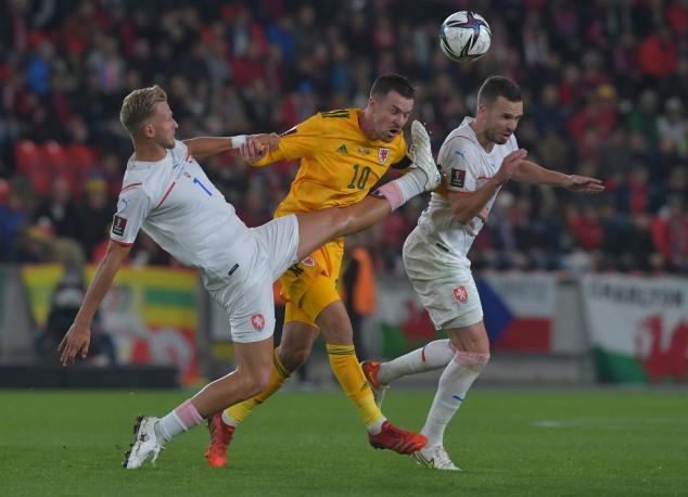 Wales draw to boost World Cup play-off hopes despite own-goal farce