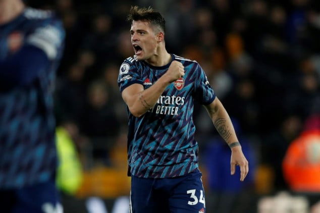 Jota double keeps Liverpool in title hunt, 10-man Arsenal win at Wolves
