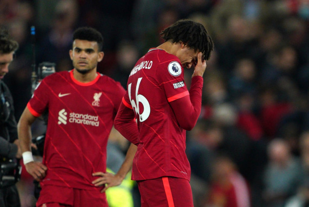 Liverpool go top but drop points in the title race